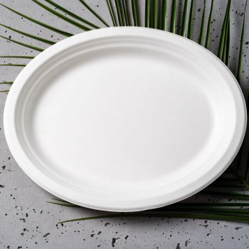 Talerz owalny 32x25 cm z trzciny cukrowej - 25 sztuk
